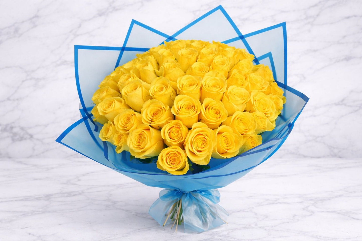 25 Yellow Roses in Elegant Blue Wrapping | Italian Flower Kuwait