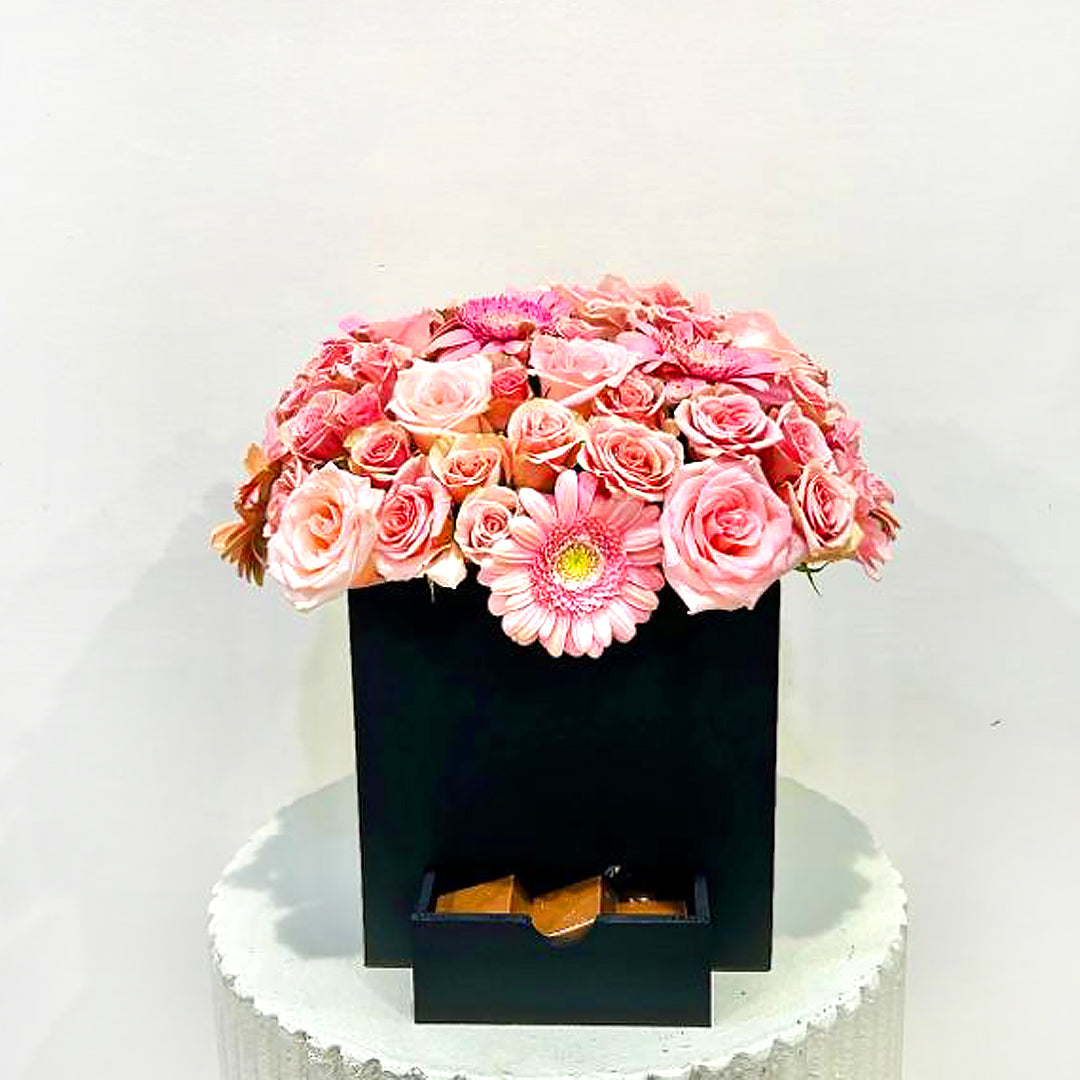 Pink Gerbera with rose and chcocolates