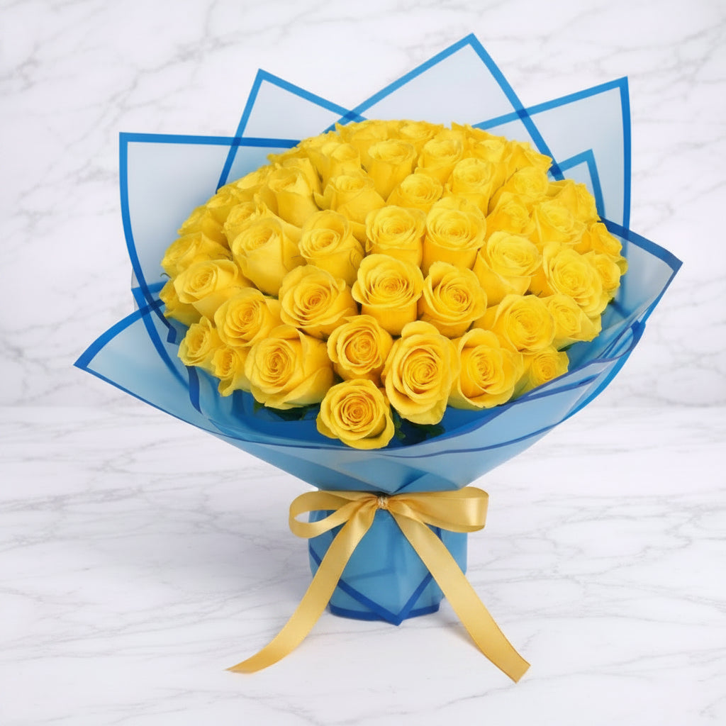 25 Yellow Roses in Elegant Blue Wrapping | Italian Flower Kuwait - italianflowerkw