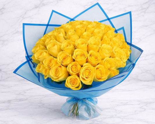 25 Yellow Roses in Elegant Blue Wrapping | Italian Flower Kuwait - italianflowerkw