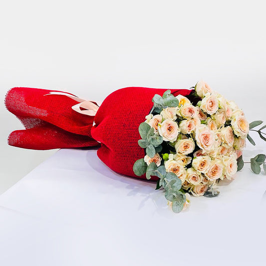 peach baby rose with red mat hand flower bouquet