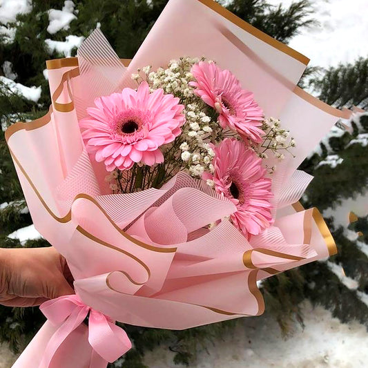 Pink Gerbera with gypsophilia hand flower bouquet