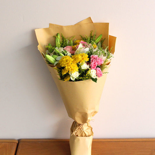 Roses with casablanca mix flowers hand bouquet