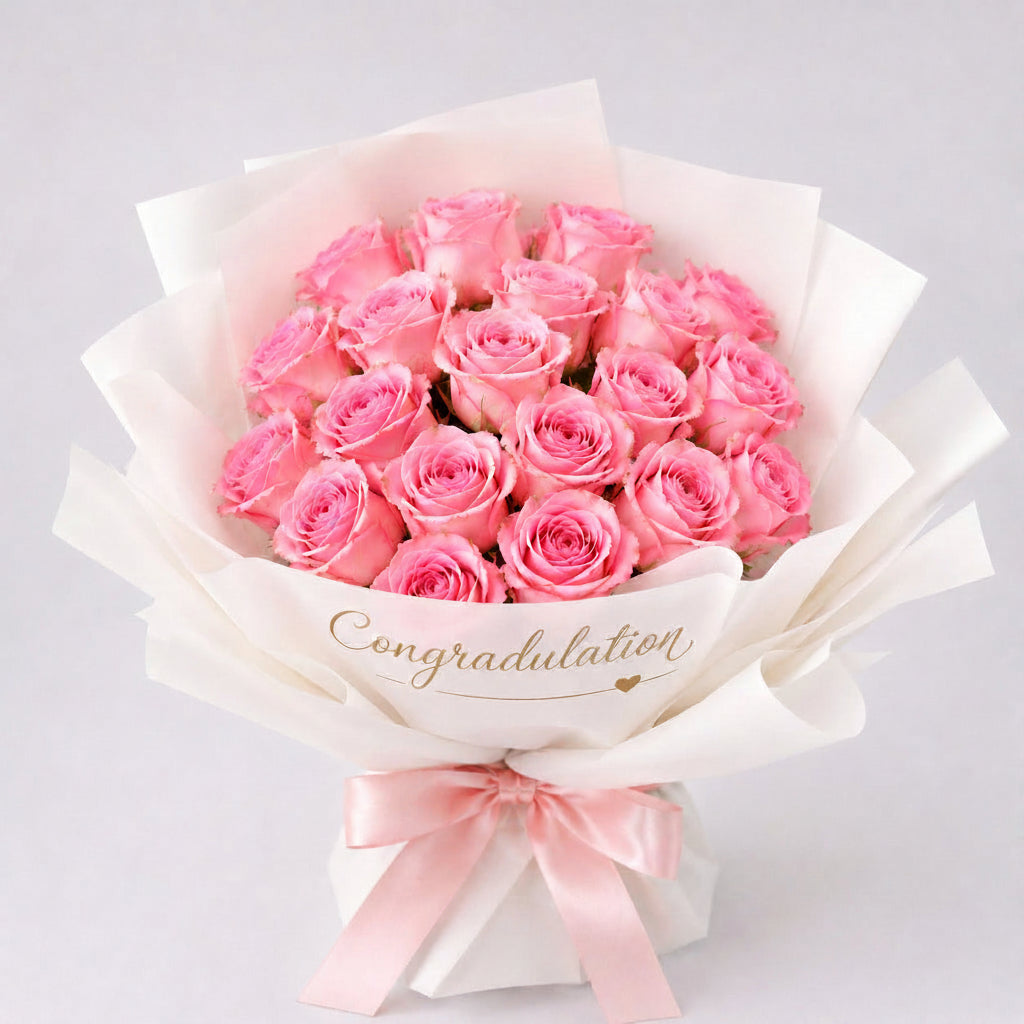 Bouquet of pink roses with a 'Congratulations' message on a light gray background