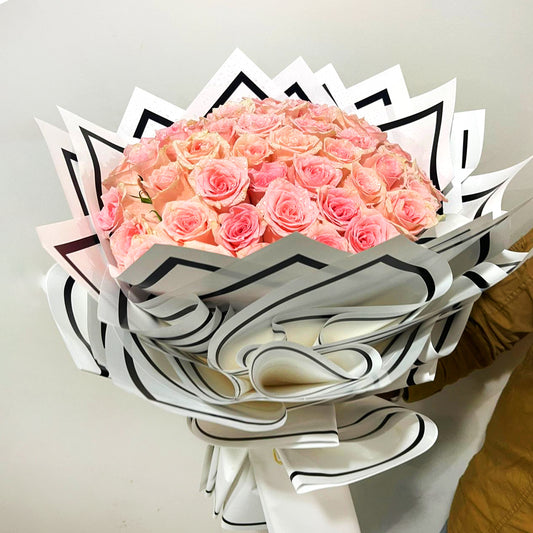 Pink roses Hand flower bouquet